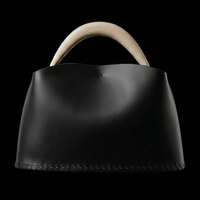 Leather and ceramic bag